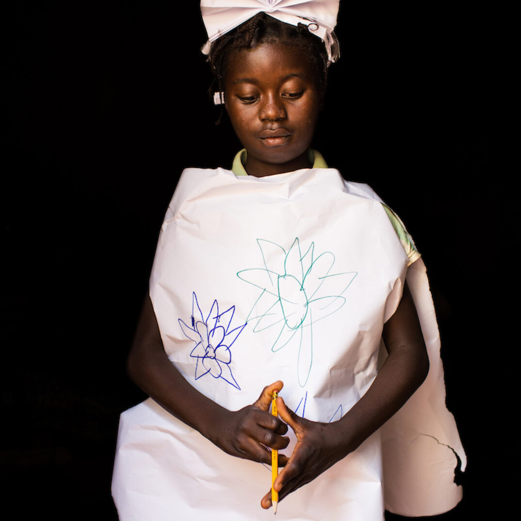 Maimouna poses dressed up as a nurse, in Carnot, Central African Republic.
Only the organization Doctors Without Borders brings health care to the displaced families living within the enclave.